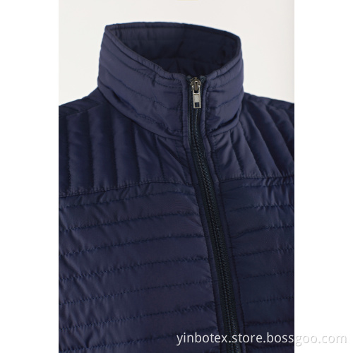 Navy quilted light vest with stand collar